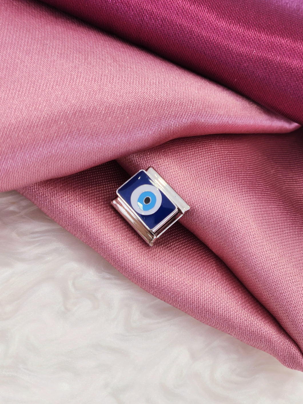 Charm ojo azul plateado