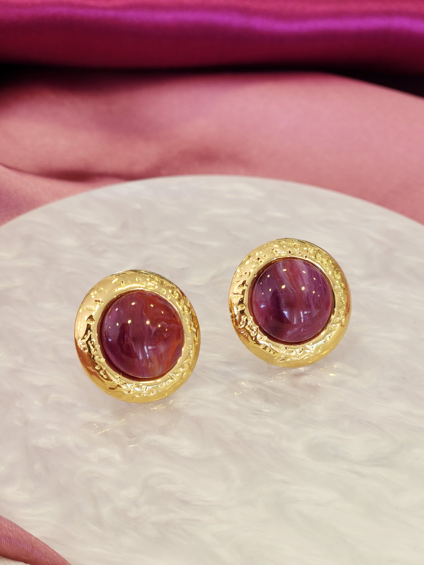 Aretes redondos morados #C97
