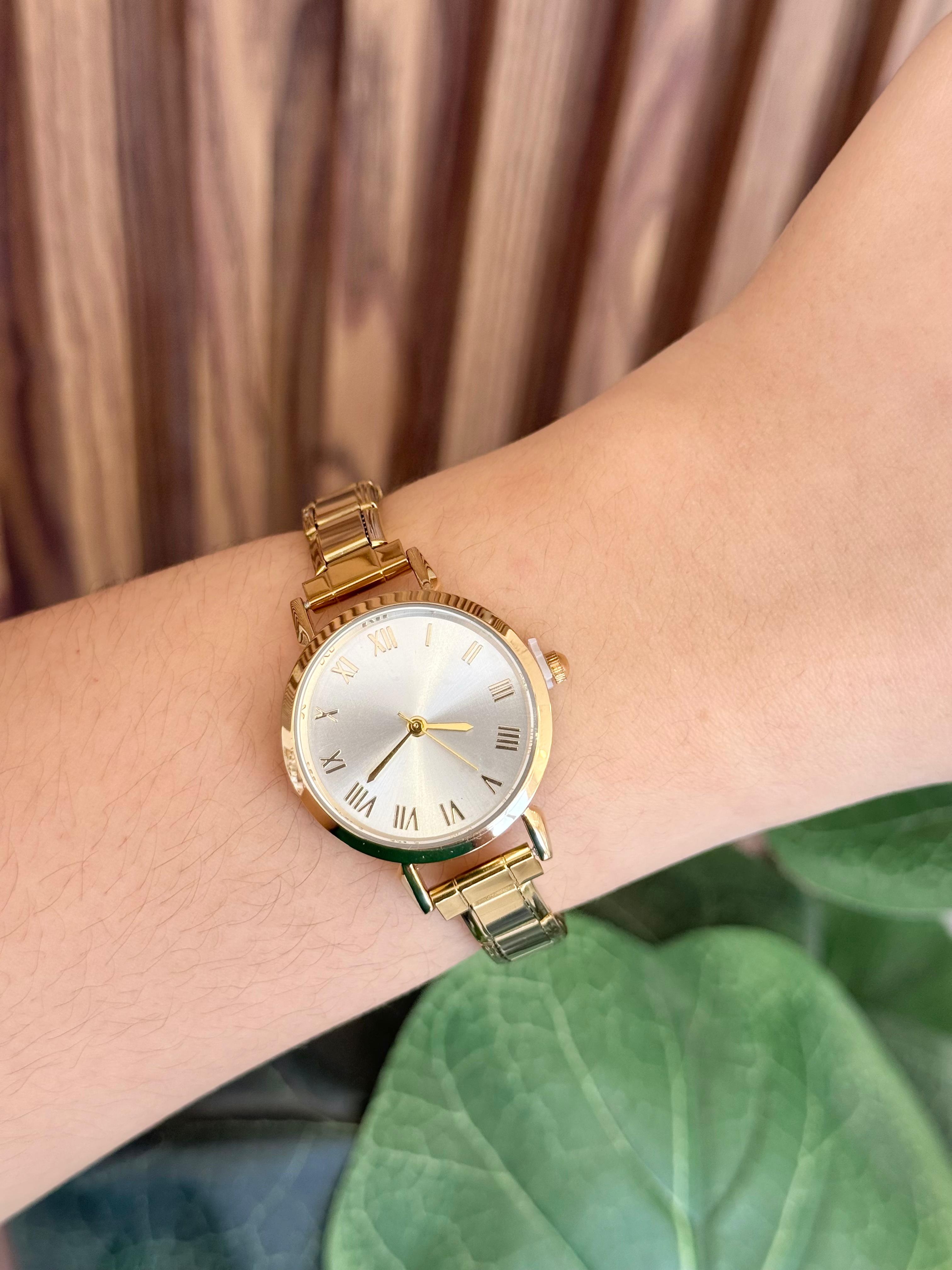 Reloj dorado romanos perla