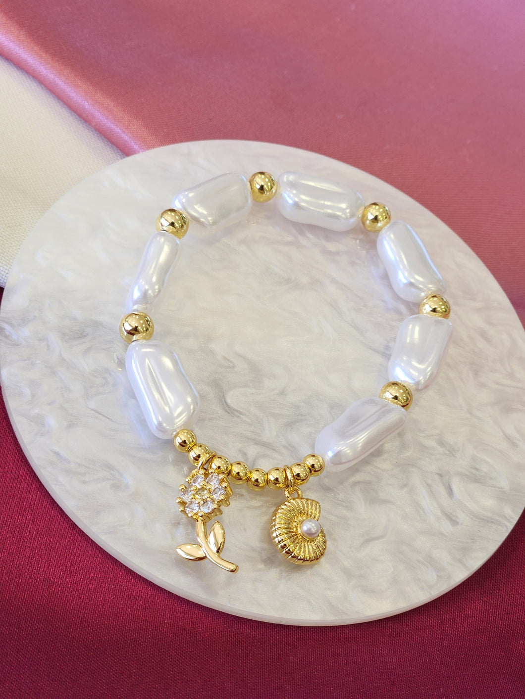 Pulsera perlas alargadas flor concha #F9