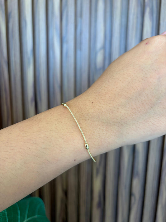 Pulsera bolitas alargadas