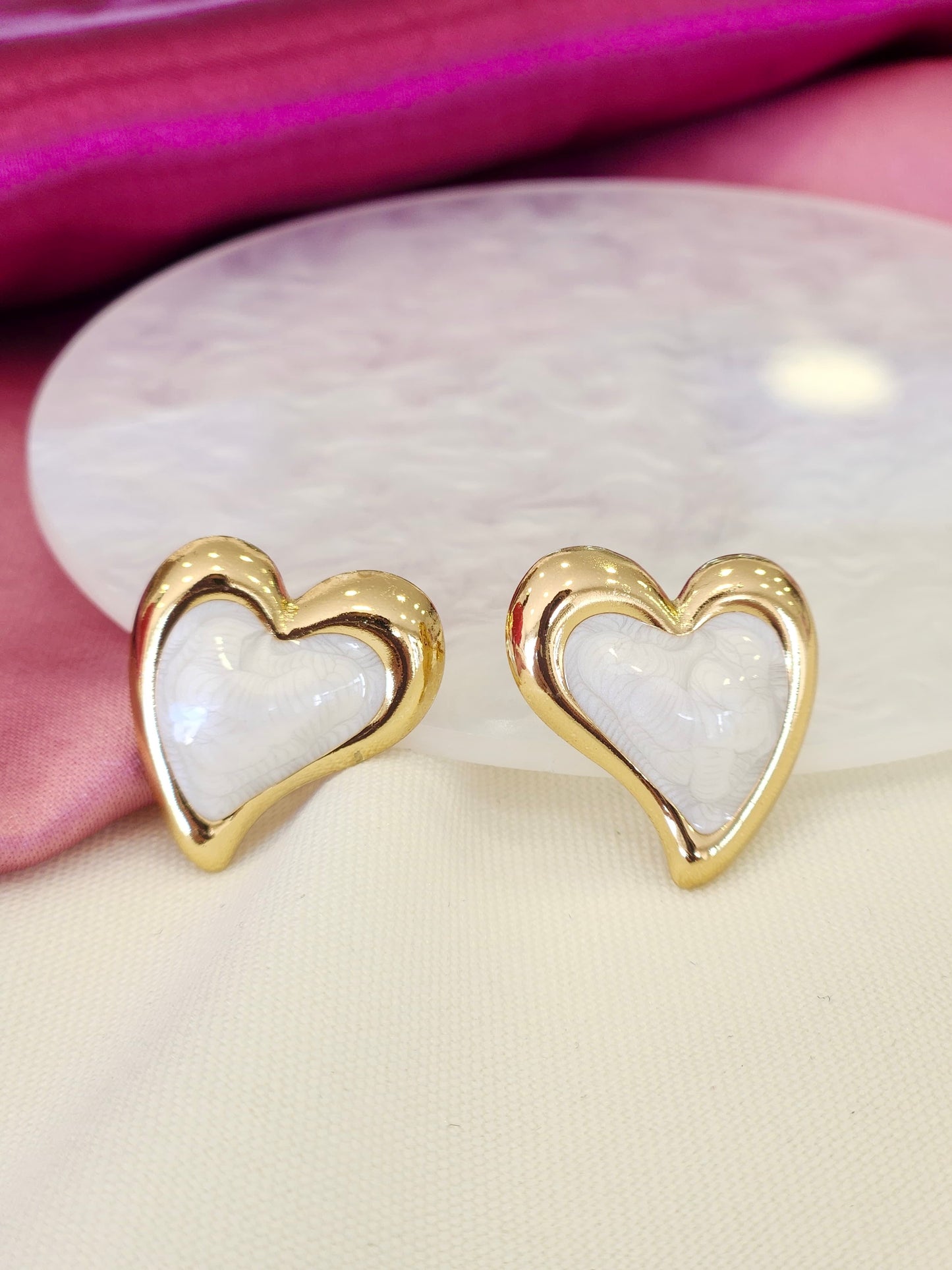 Aretes corazon blanco