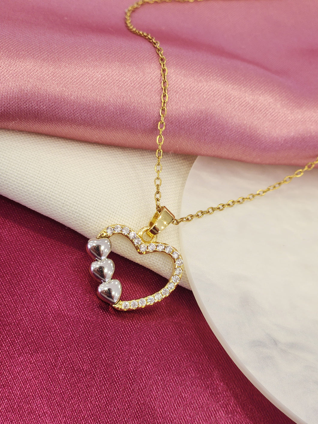 Collar cuatro corazones bicolor #M