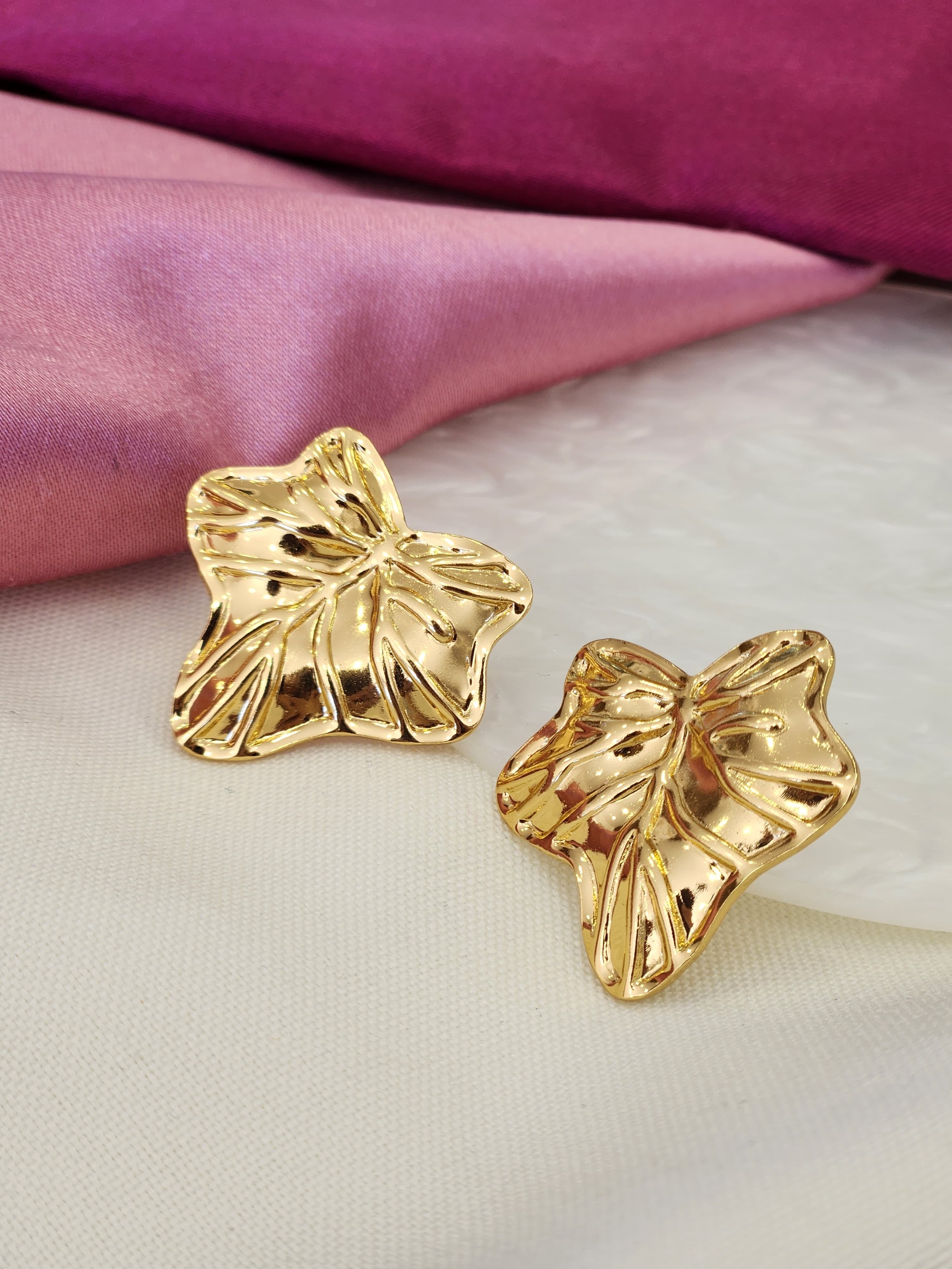 Aretes hojas relieve #K25