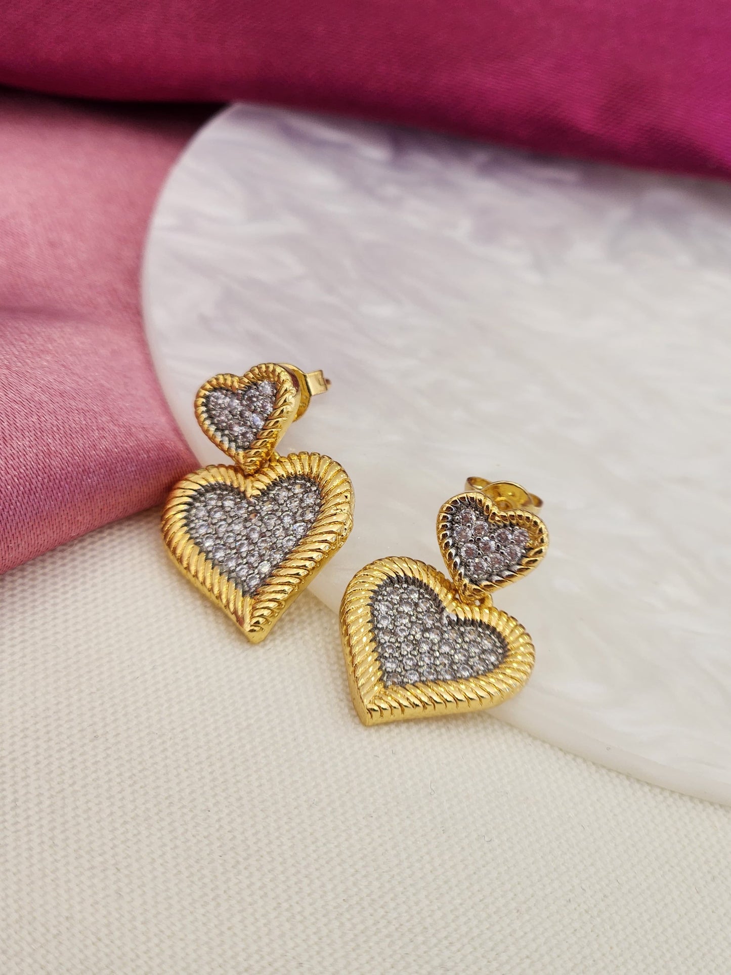 Aretes doble corazon bicolor #E27