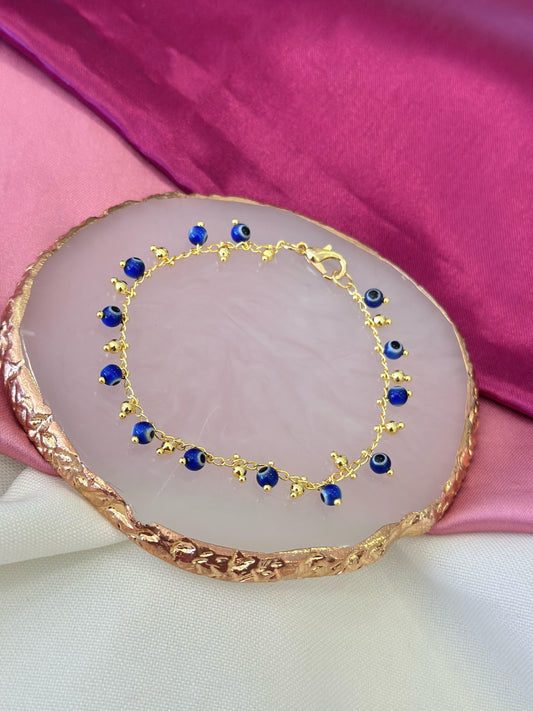 Pulsera ojos inflados azules #M1
