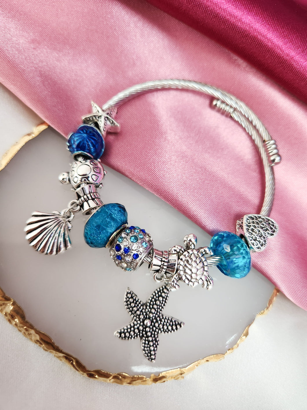 Pulsera tipo Pandora con charms estrella de mar y tortuga color aqua #A7