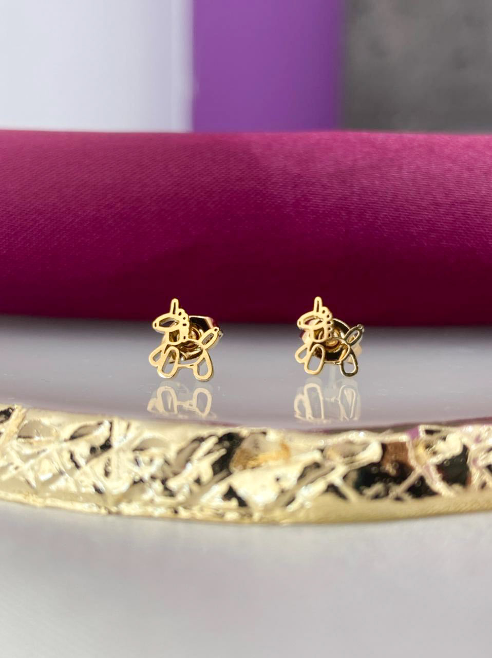 Aretes broquel unicornio hueco #14.1
