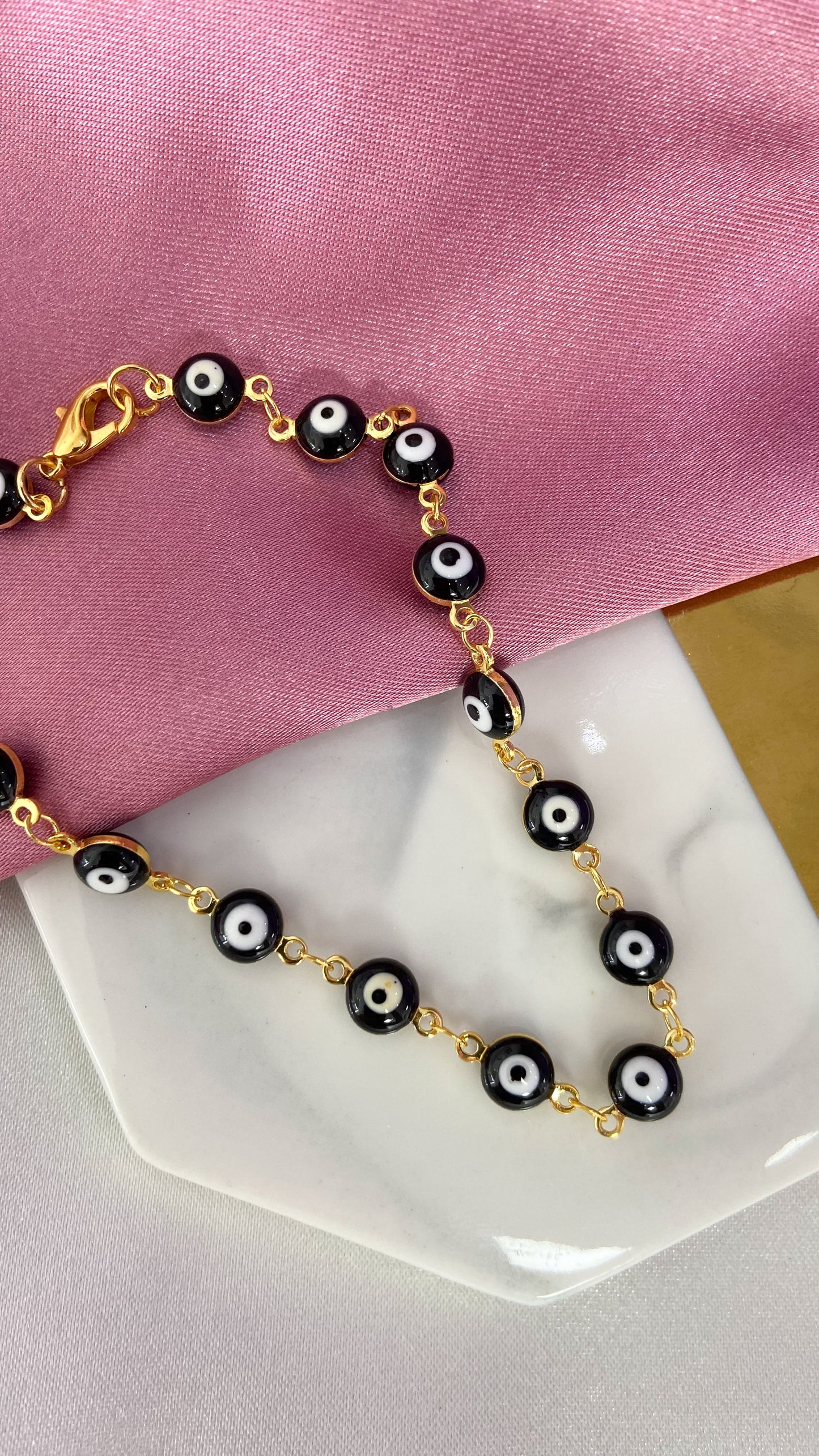 Tobillera ojos medianos negro #M2.1