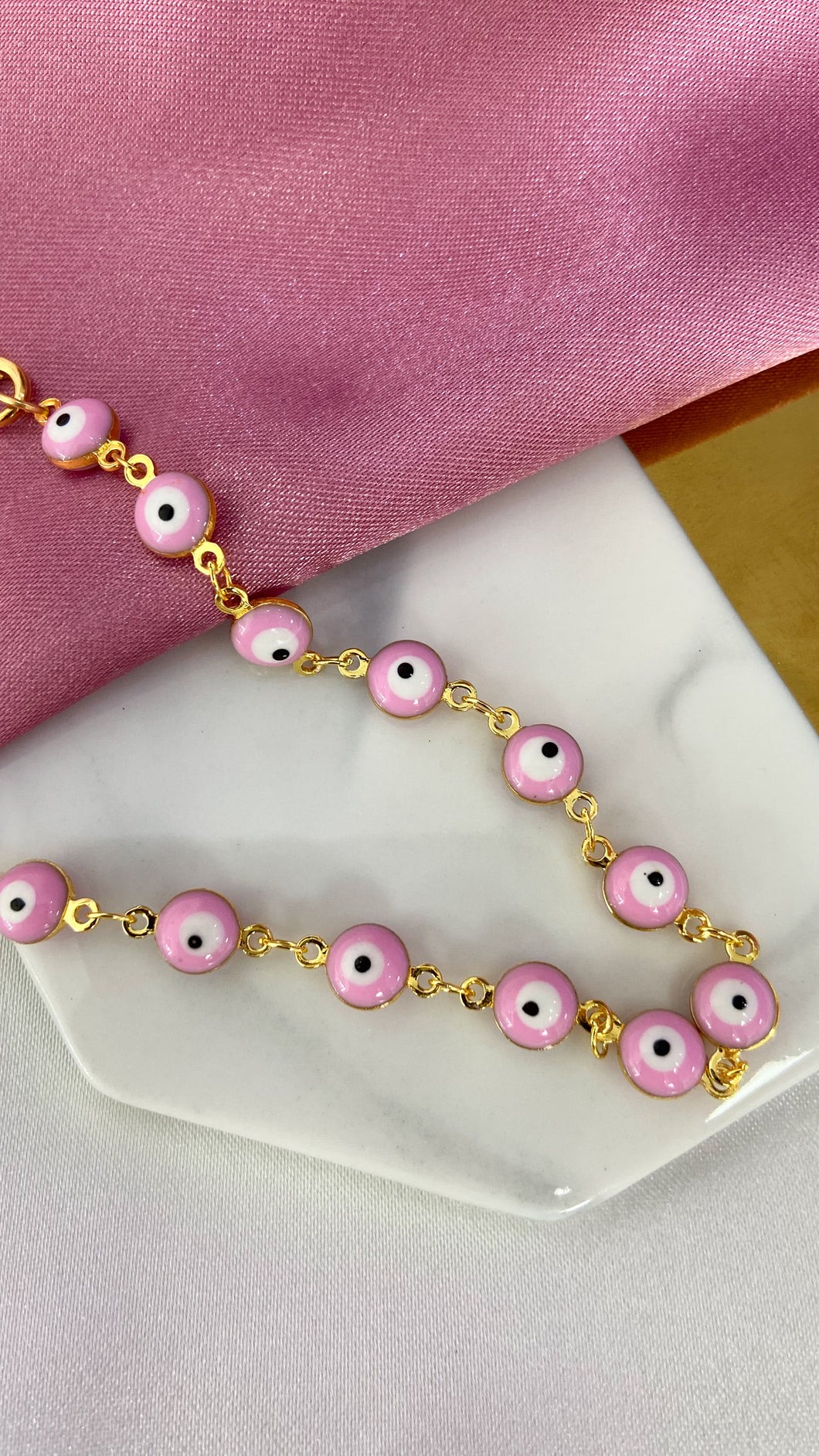 Tobillera ojos medianos rosa
