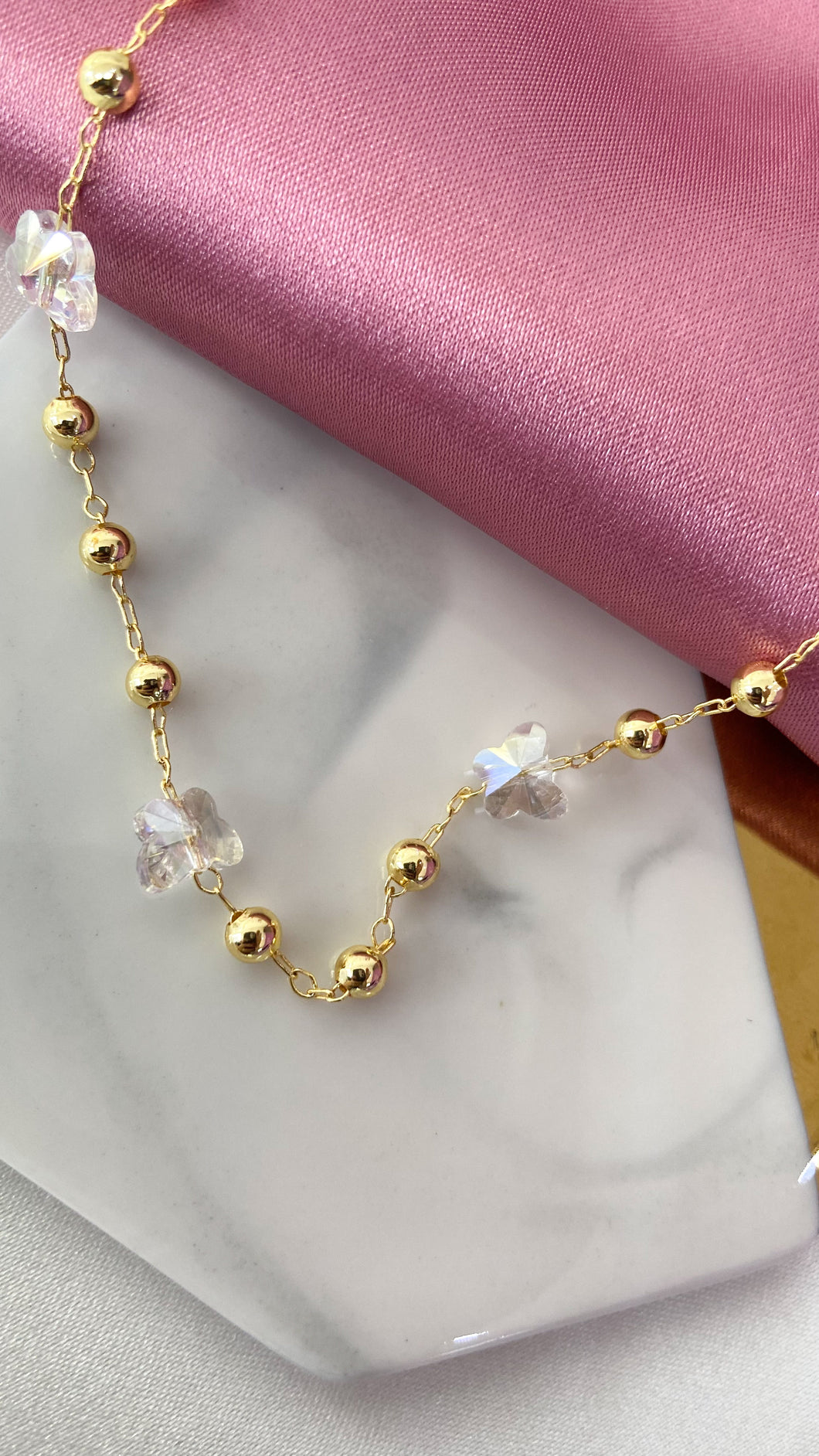 Tobillera mariposa swarovski bolitas doradas