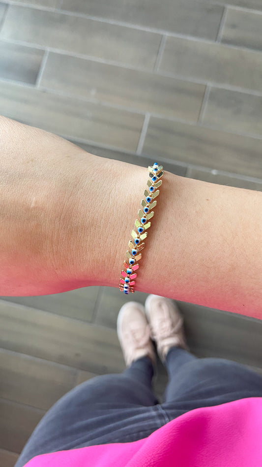 Pulsera flecha con ojo azul mini #M1